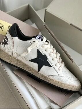 Golden Goose White Sneakers with Black Star Accent
